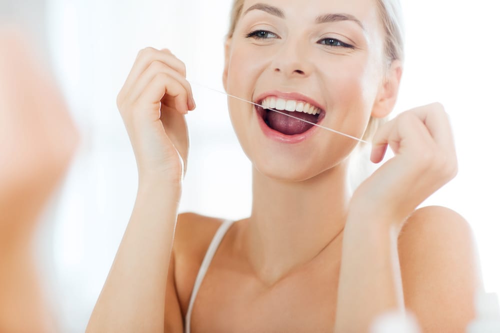 Health Care Dental Hygiene People And Beauty Concept - Smiling